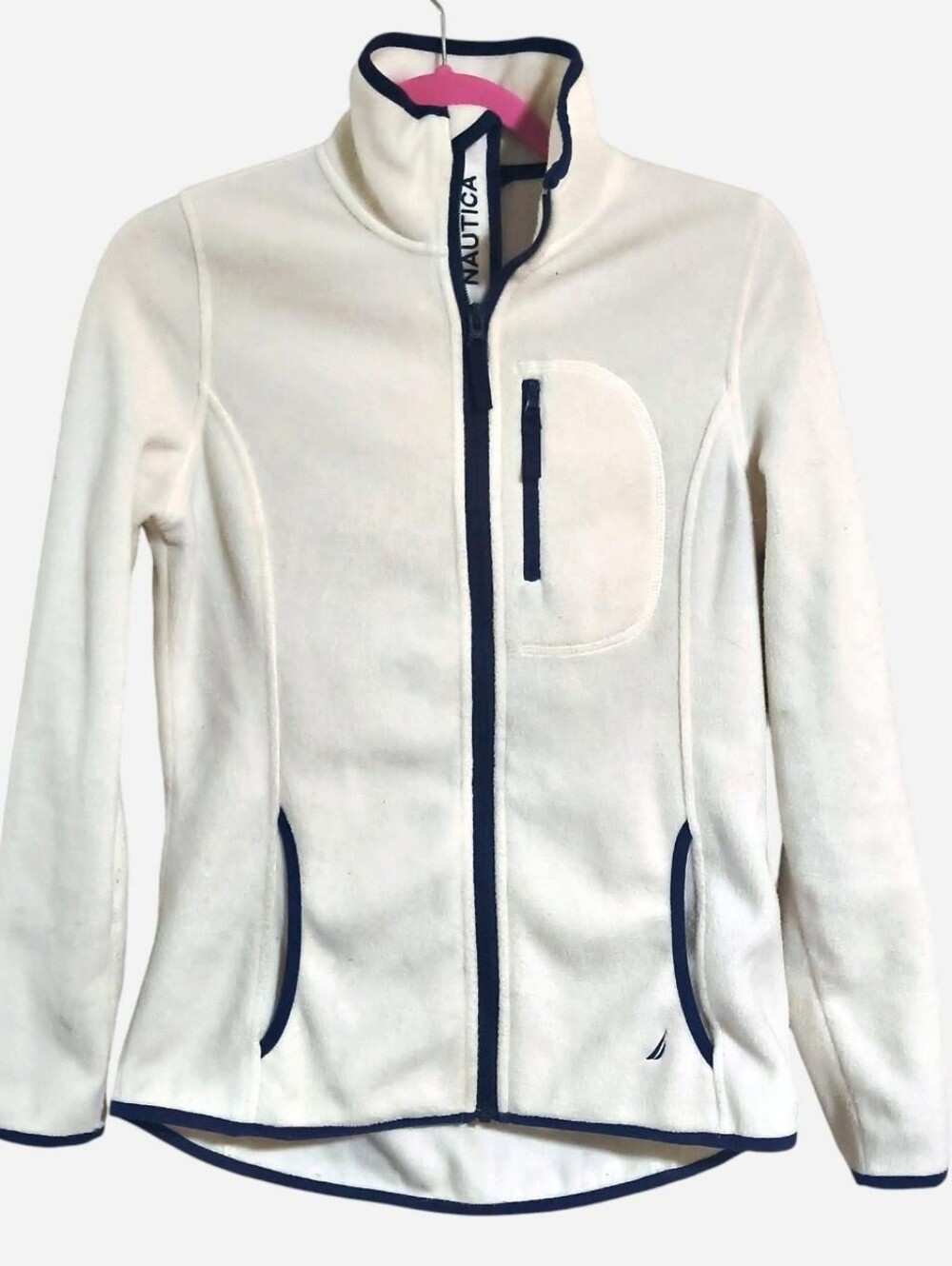 Nautica white fleece jacket with navy blue trim and pockets, very soft and warm